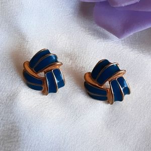 Vintage (1970's)  blue love knot enamel earrings.  post back for pierced…